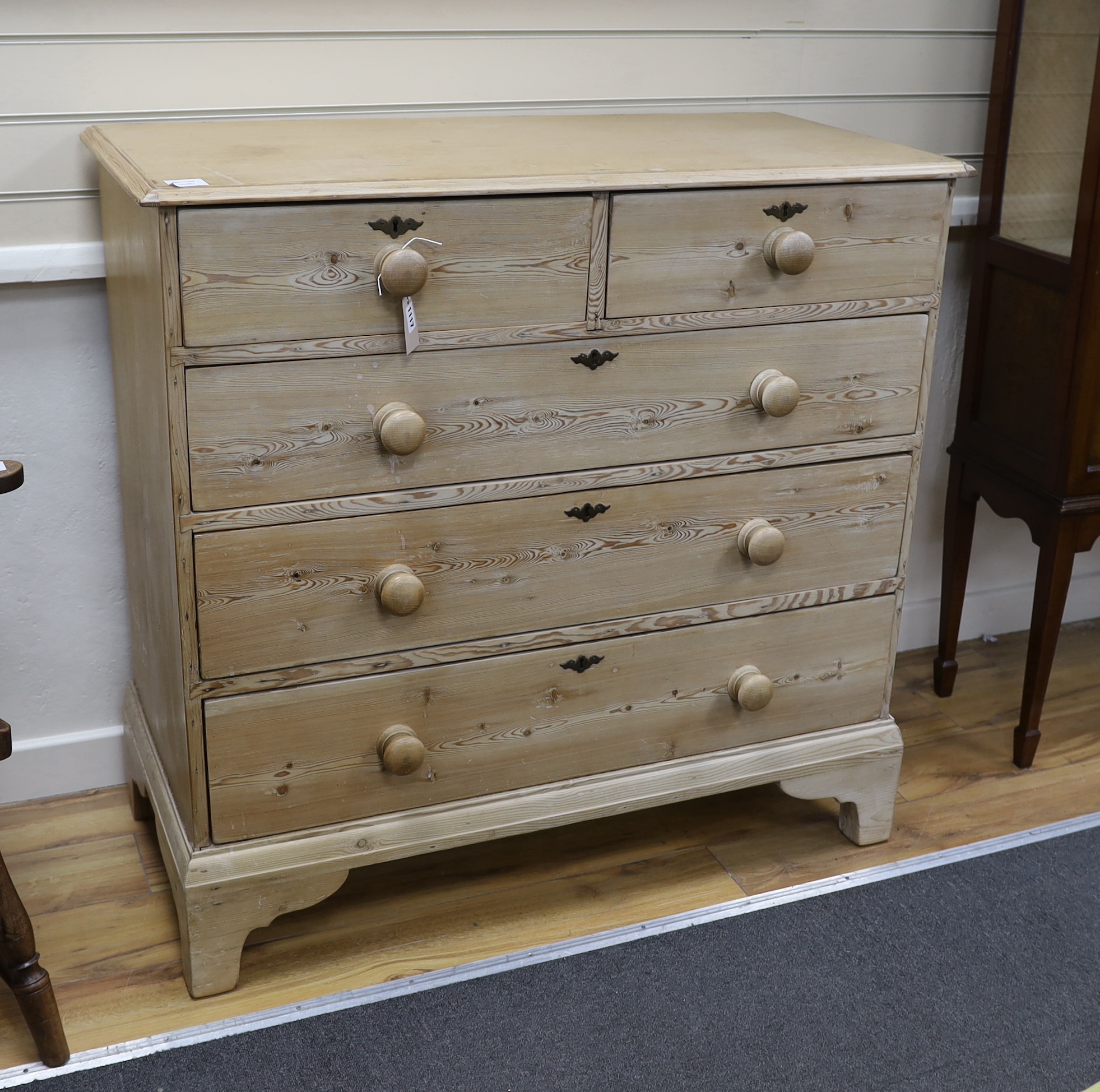 An early 19th century pine chest of five drawers, width 106cm, depth 49cm, height 102cm